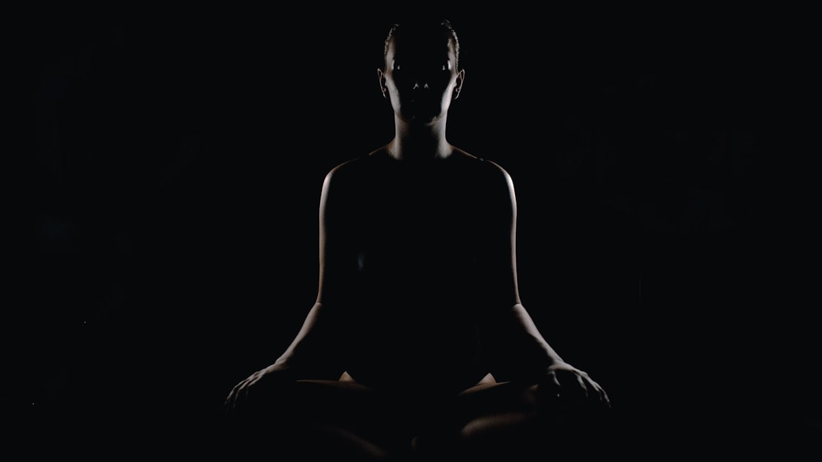 person doing meditation pose
